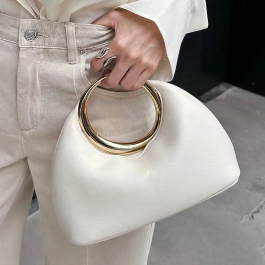 Luxury Sculpted Black Handbag with Gold Circular Handle – Modern Statement Top Handle Purse for Women