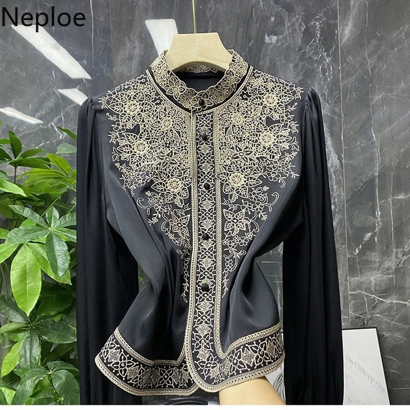 Modern designed vintage blouse/Stand Collar Embroidery Blouse Embraced in Fashion/Long Sleeve fitted, made with polyester material.