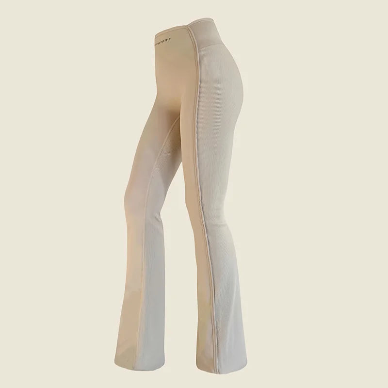 “High-waisted sculpting flare yoga pants with dual-curve construction and moisture-wicking stretch fabric.”