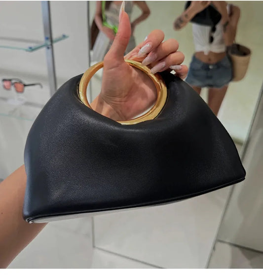 Luxury Sculpted Black Handbag with Gold Circular Handle – Modern Statement Top Handle Purse for Women