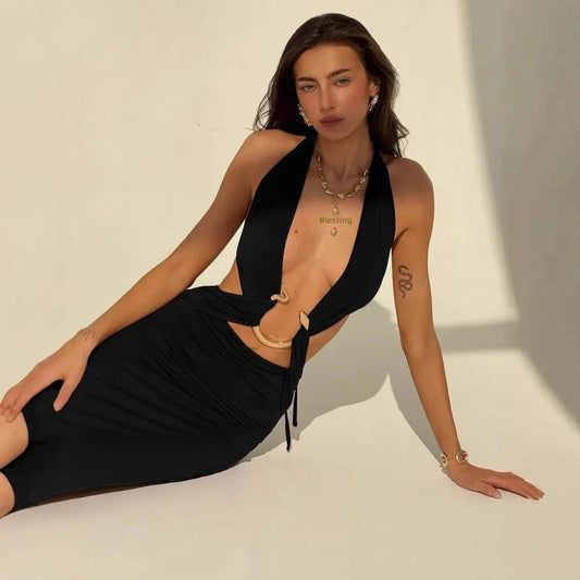 Maxi dress/appealing snake print design. Backless V neckline, adjusted to the ankle.