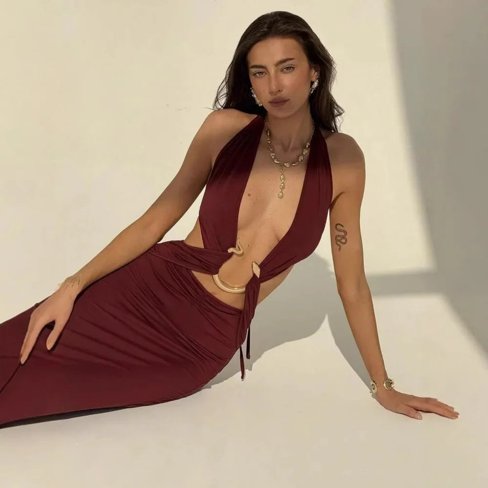 Maxi dress/appealing snake print design. Backless V neckline, adjusted to the ankle.